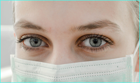 Physician wearing surgical mask