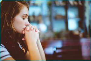 young woman thinking