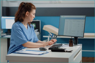 nurse at computer